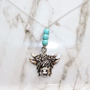 Western highland cow pendant with turquoise beads
